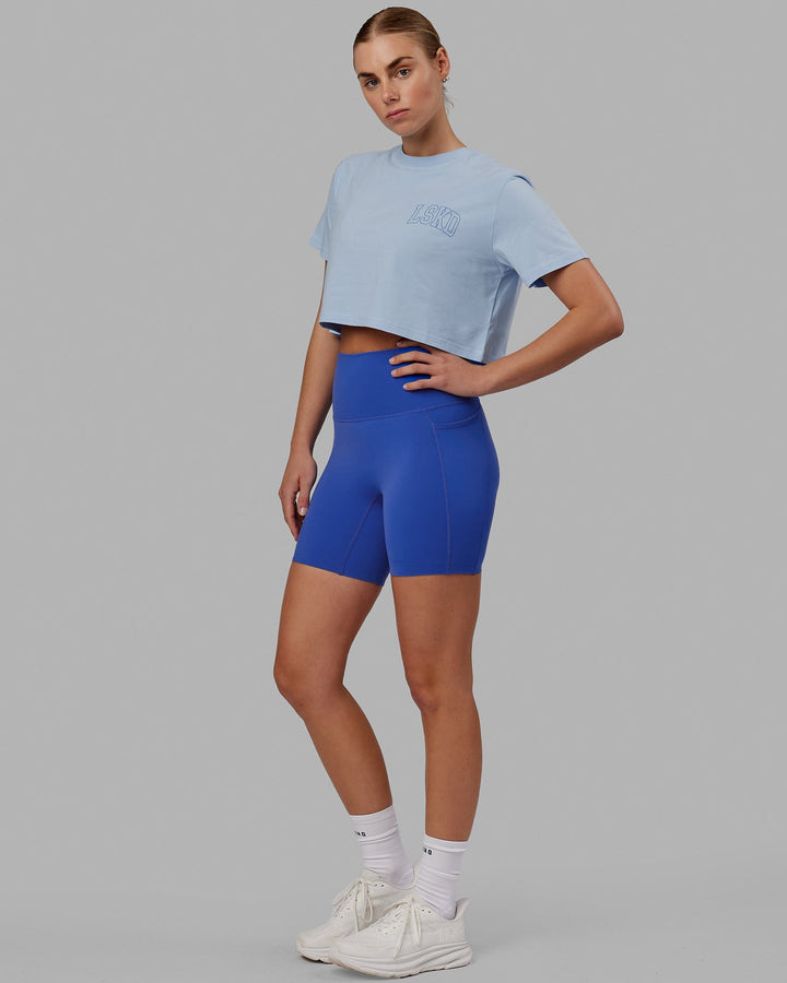 Woman wearing Finish Line Cropped Tee - Windsurfer-Power Cobalt