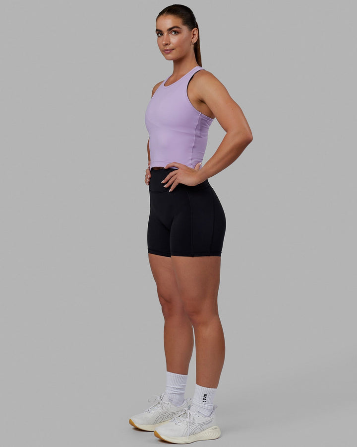 Woman wearing Flow Performance Tank - Pale Lilac