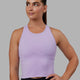 Woman wearing Flow Performance Tank - Pale Lilac