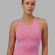 Woman wearing Flow Performance Tank - Pink Rose