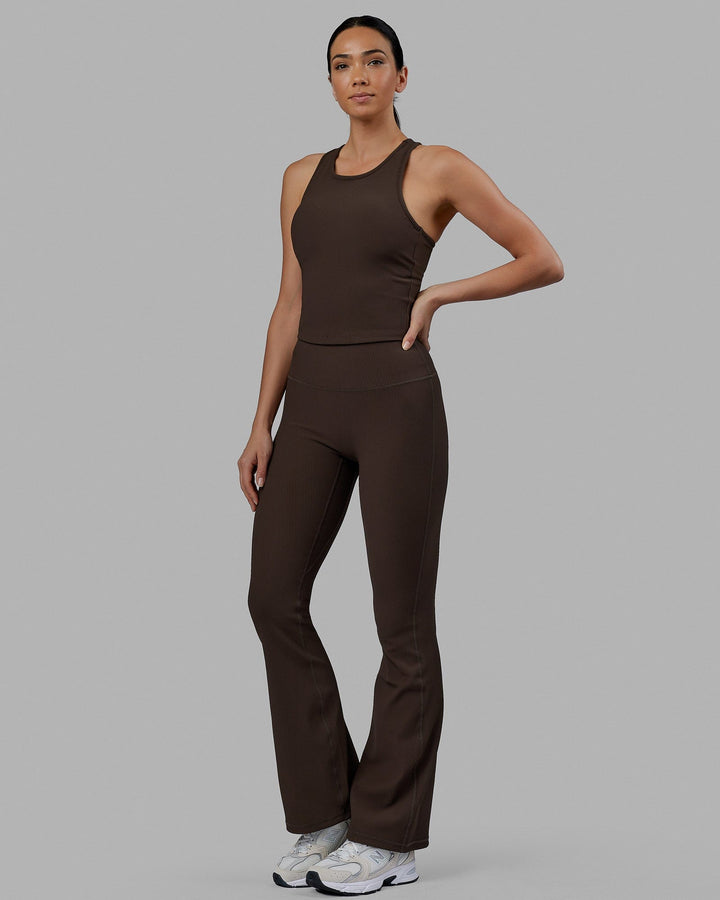 Woman wearing Flow Ribbed Shelf Bra Performance Tank - Dark Chocolate