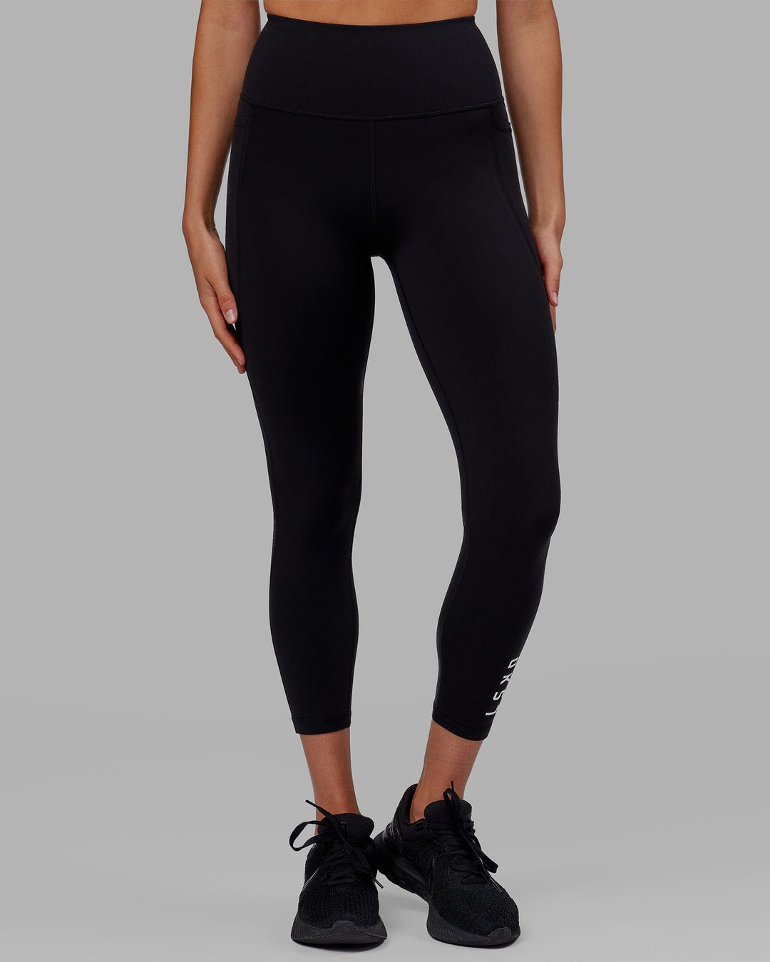Woman wearing Flux Ultra High-Rise 7/8 Legging Pockets - Black