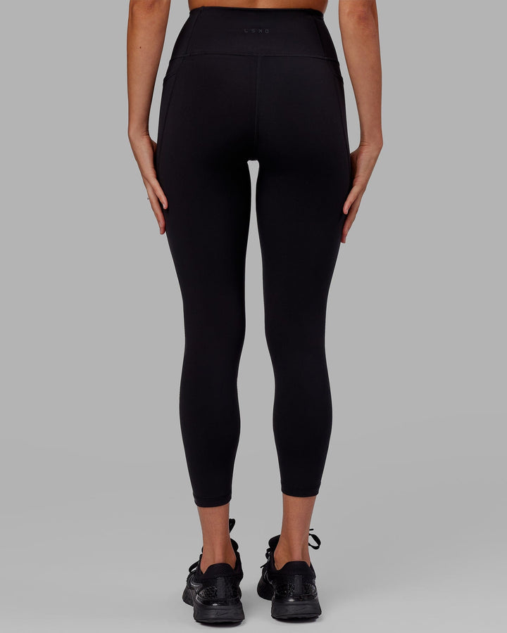 Woman wearing Flux 7/8 Length Tight - Black