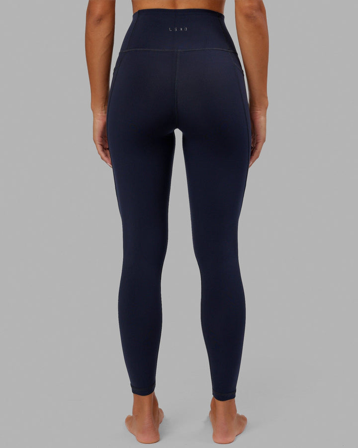 Woman wearing Flux Full Length Tight - Navy