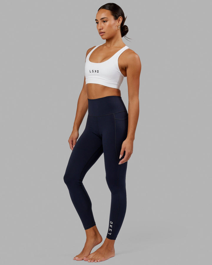 Woman wearing Flux Full Length Tight - Navy