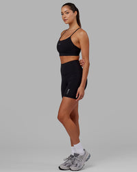 Woman wearing Flux Ultra High-Rise 6" Short Pockets - Black