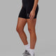 Woman wearing Flux Mid Short Tight - Black