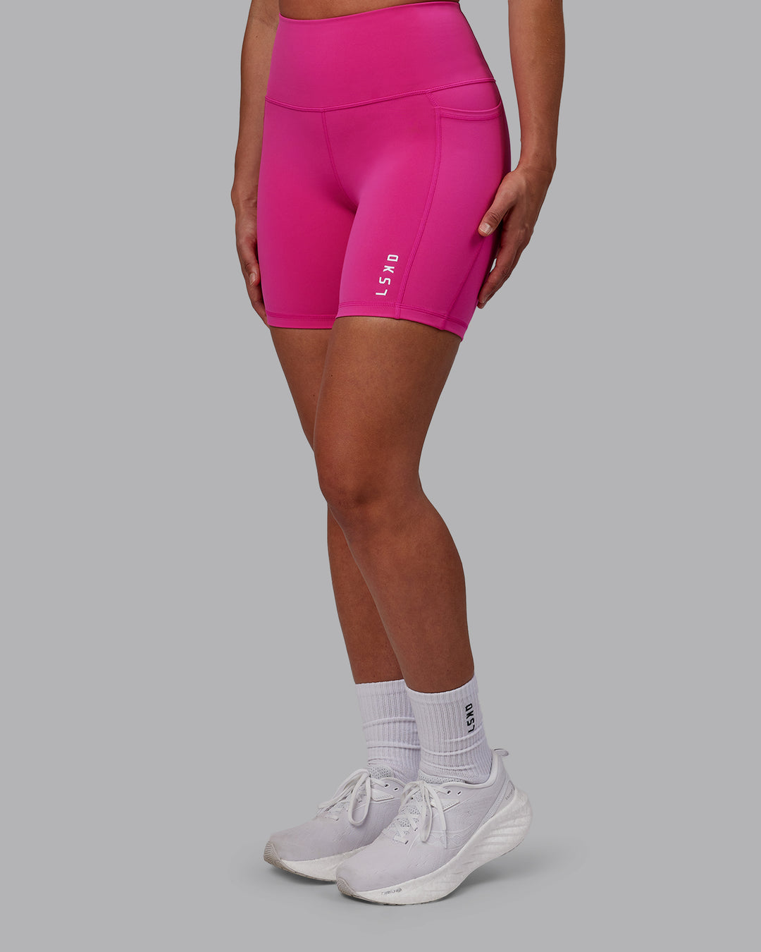Woman wearing Flux Ultra High-Rise 6" Short Pockets - Fuchsia Pink