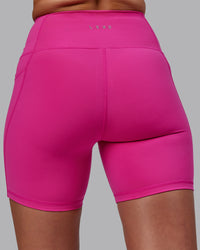Woman wearing Flux Ultra High-Rise 6" Short Pockets - Fuchsia Pink