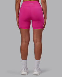 Woman wearing Flux Ultra High-Rise 6" Short Pockets - Fuchsia Pink