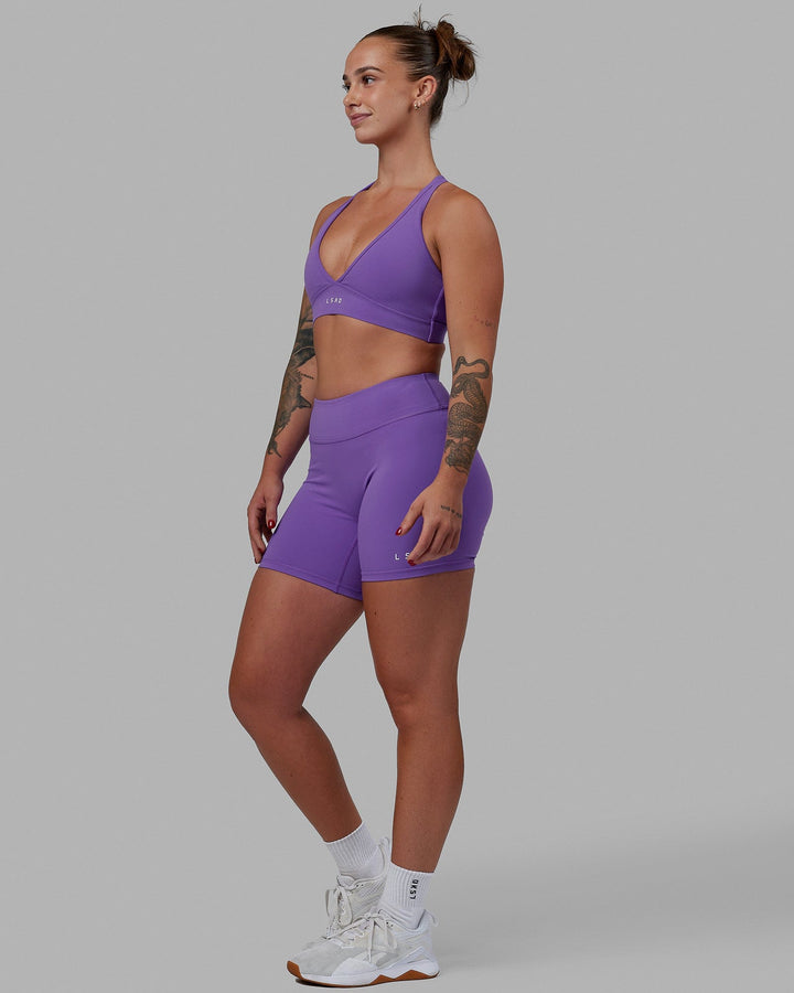 Woman wearing Form Sports Bra - Iris