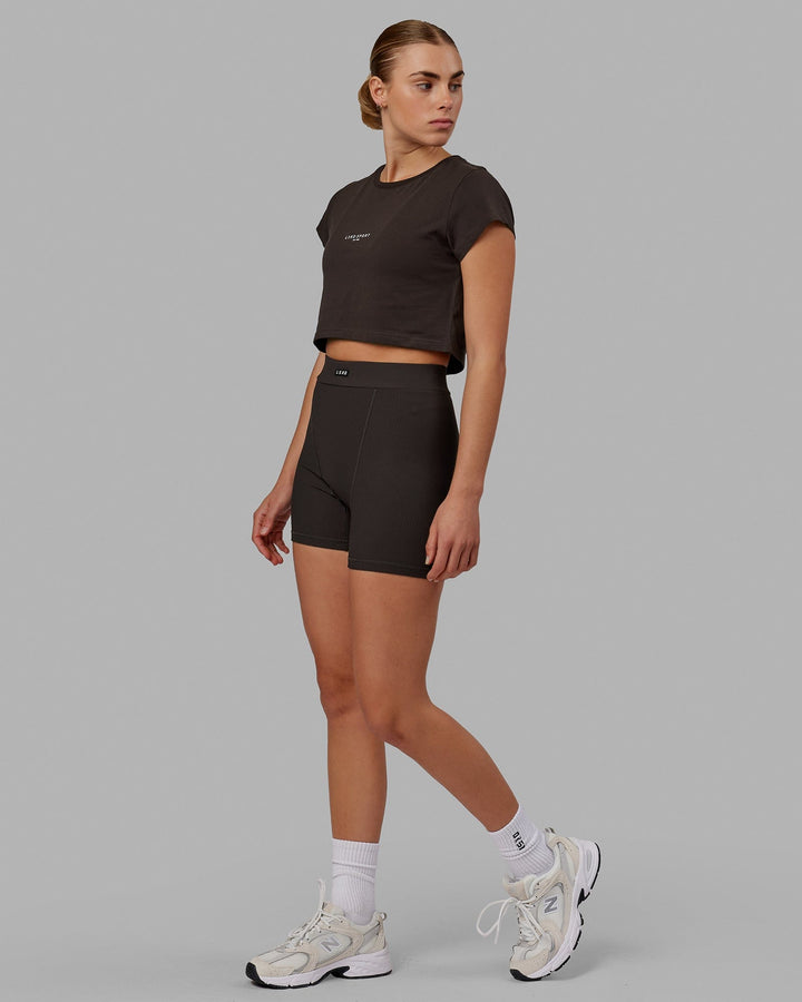 Woman wearing Front Runner Baby Tee - Dark Walnut