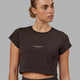 Woman wearing Front Runner Baby Tee - Dark Walnut