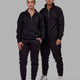 Duo wearing Unisex Fundamental 1/4 Zip Sweater - Black