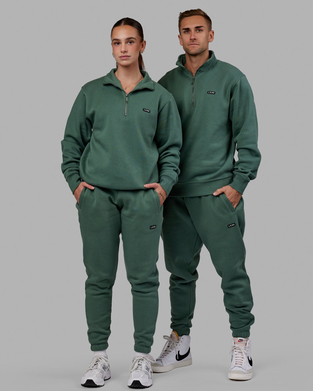 Duo wearing Unisex Fundamental 1/4 Zip Sweater - Dark Forest