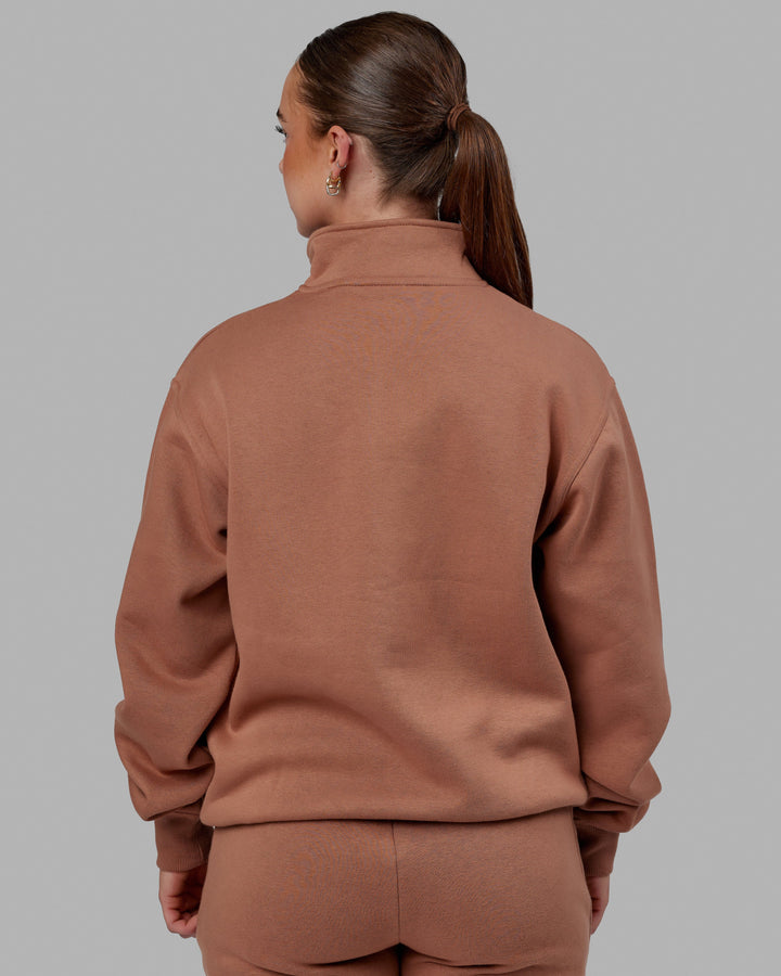 Woman wearing Unisex Fundamental 1/4 Zip Sweater - Raw Umber
