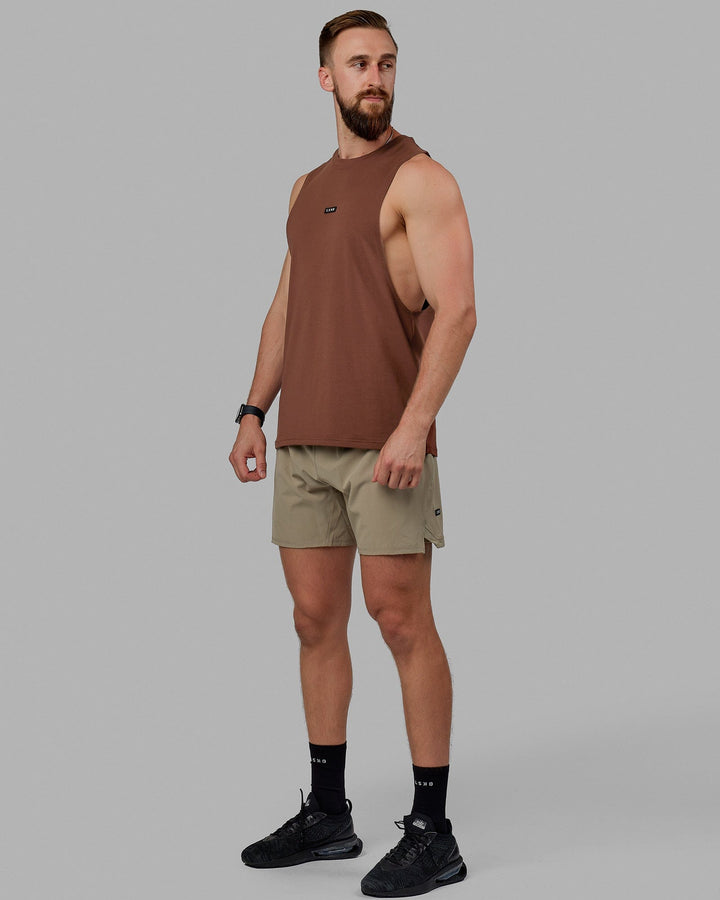 Man wearing Fundamental FLXCotton Drop Arm Tank - Cappuccino