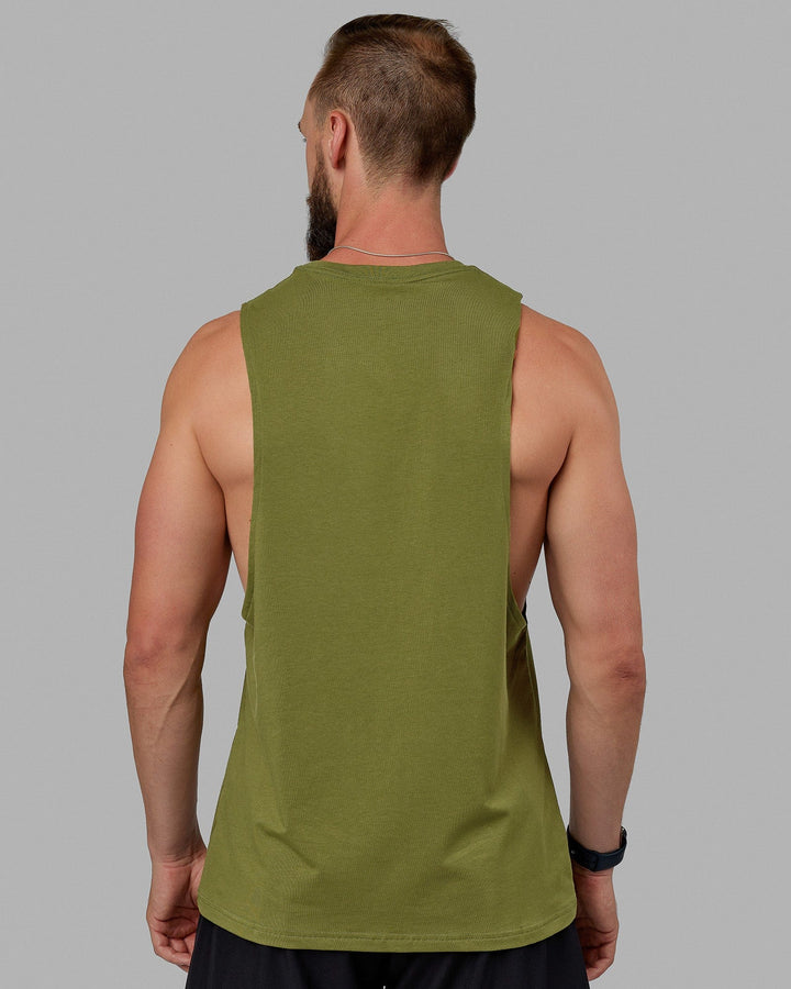 Man wearing Fundamental FLXCotton Drop Arm Tank - Moss