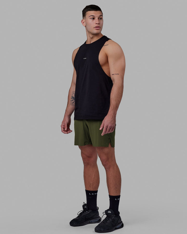 Man wearing Fundamental FLXCotton Drop Arm Tank - Black