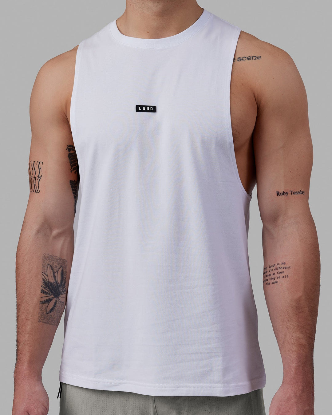 Man wearing Fundamental FLXCotton Drop Arm Tank - White