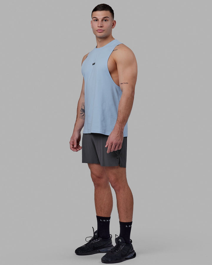 Man wearing Fundamental FLXCotton Drop Arm Tank - Windsurfer