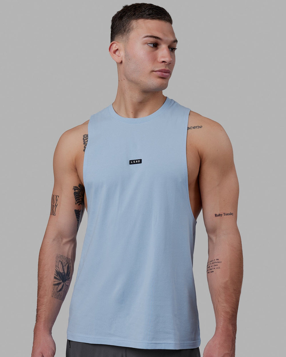Man wearing Fundamental FLXCotton Drop Arm Tank - Windsurfer