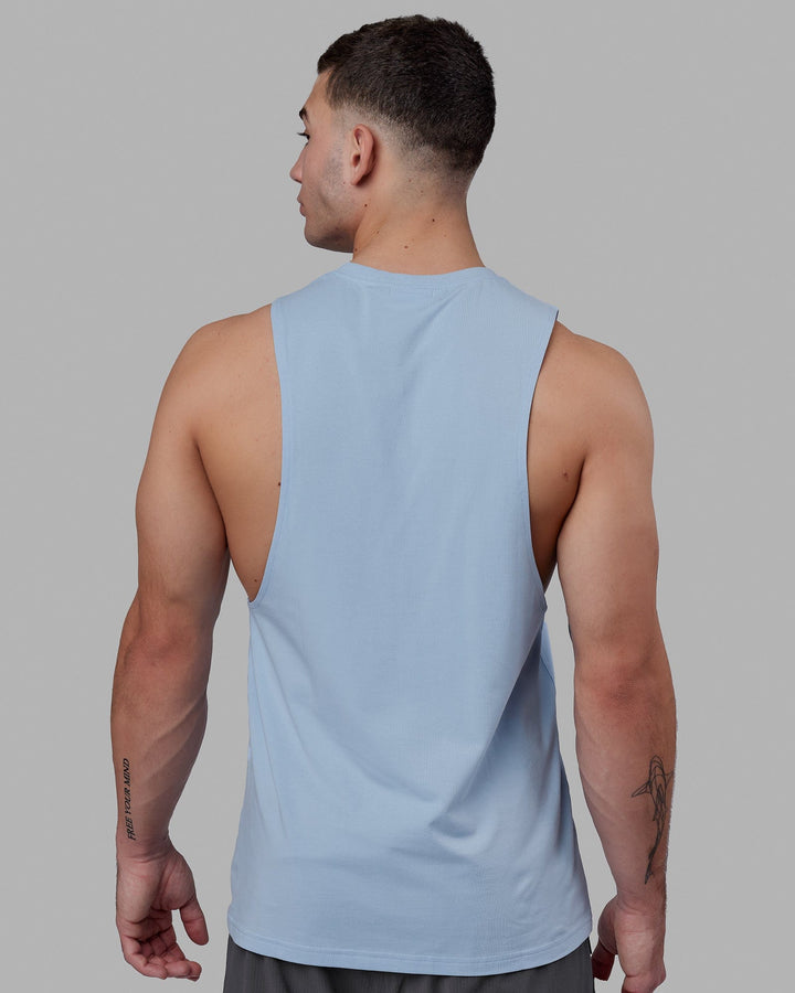 Man wearing Fundamental FLXCotton Drop Arm Tank - Windsurfer