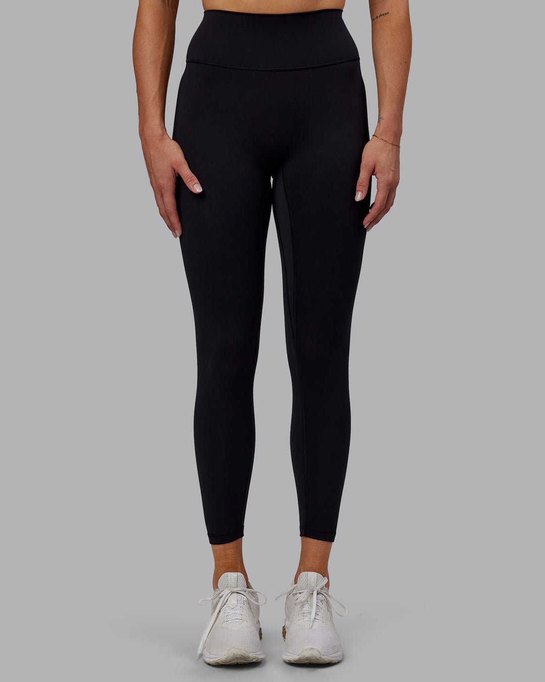 Woman wearing Fusion Ultra High-Rise 7/8 Legging - Black | Model:Hannah | Size:S