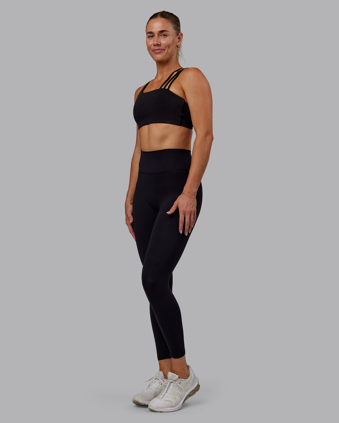 Woman wearing Fusion Ultra High-Rise 7/8 Legging - Black | Model:Hannah | Size:S