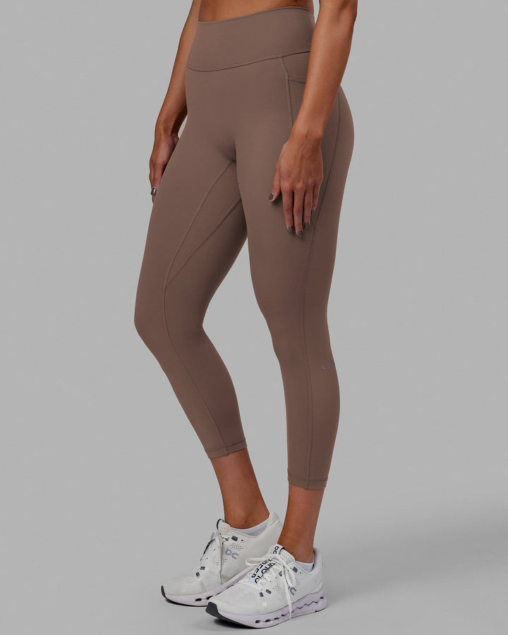 Woman wearing Fusion 7/8 Length Tight - Deep Taupe