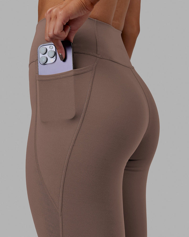 Woman wearing Fusion 7/8 Length Tight - Deep Taupe