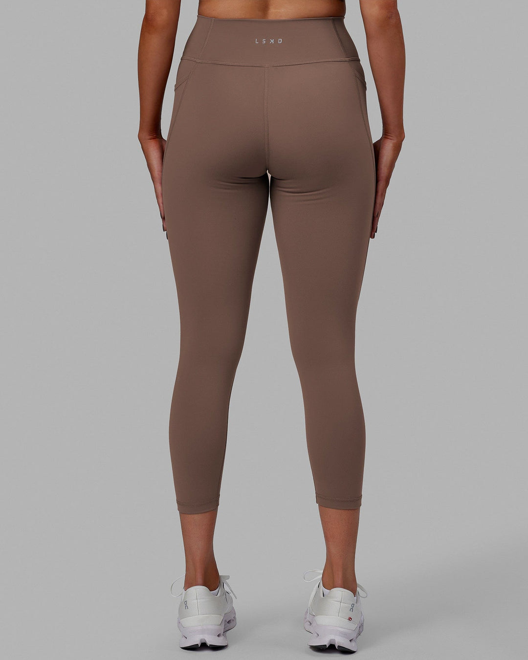 Woman wearing Fusion 7/8 Length Tight - Deep Taupe