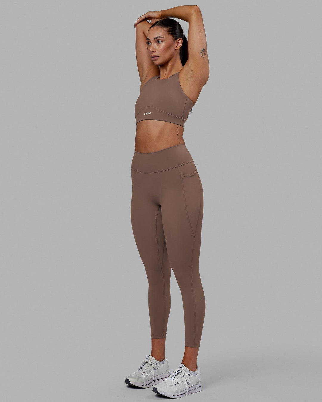 Woman wearing Fusion 7/8 Length Tight - Deep Taupe