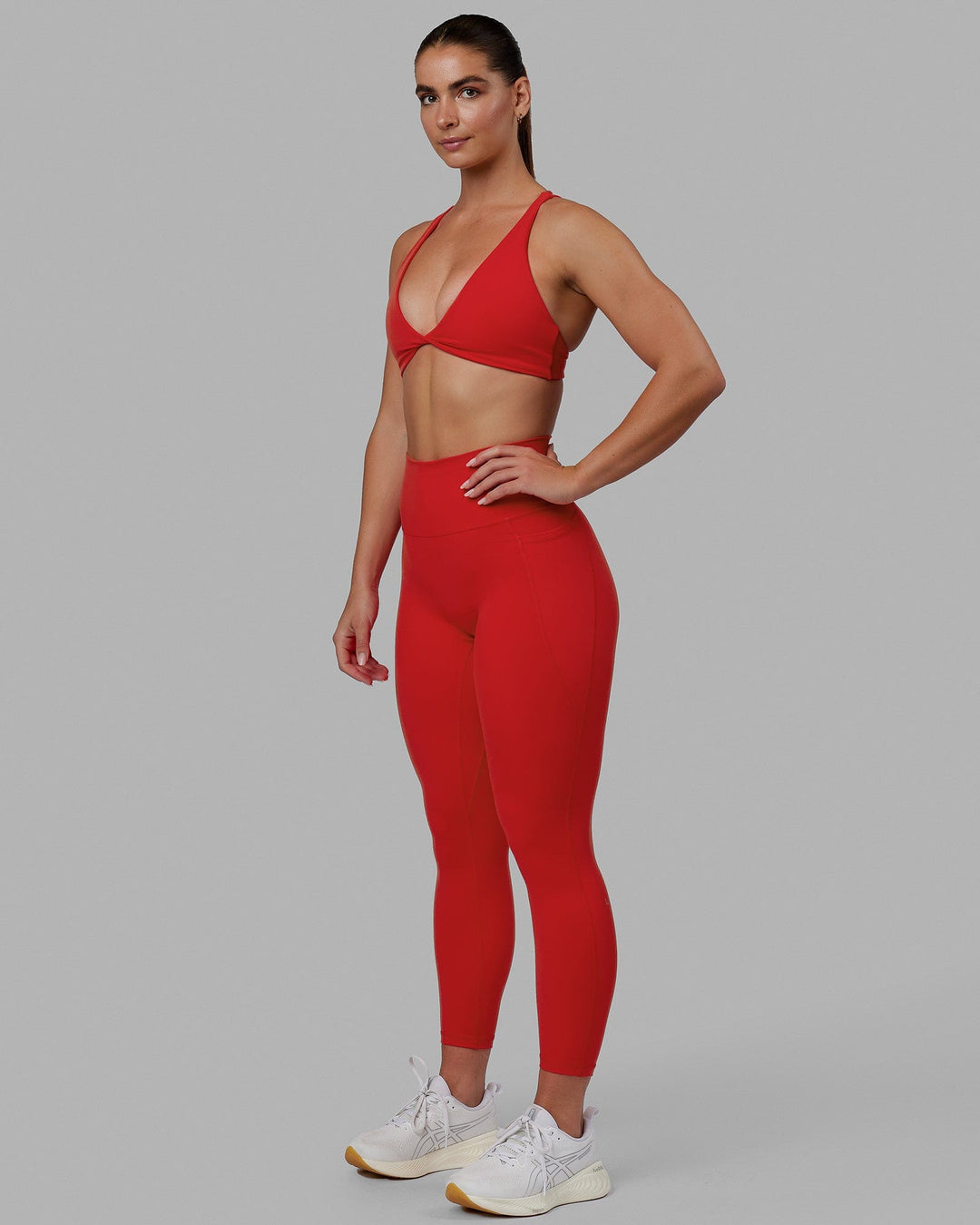Woman wearing Fusion 7/8 Length Tights - Infrared