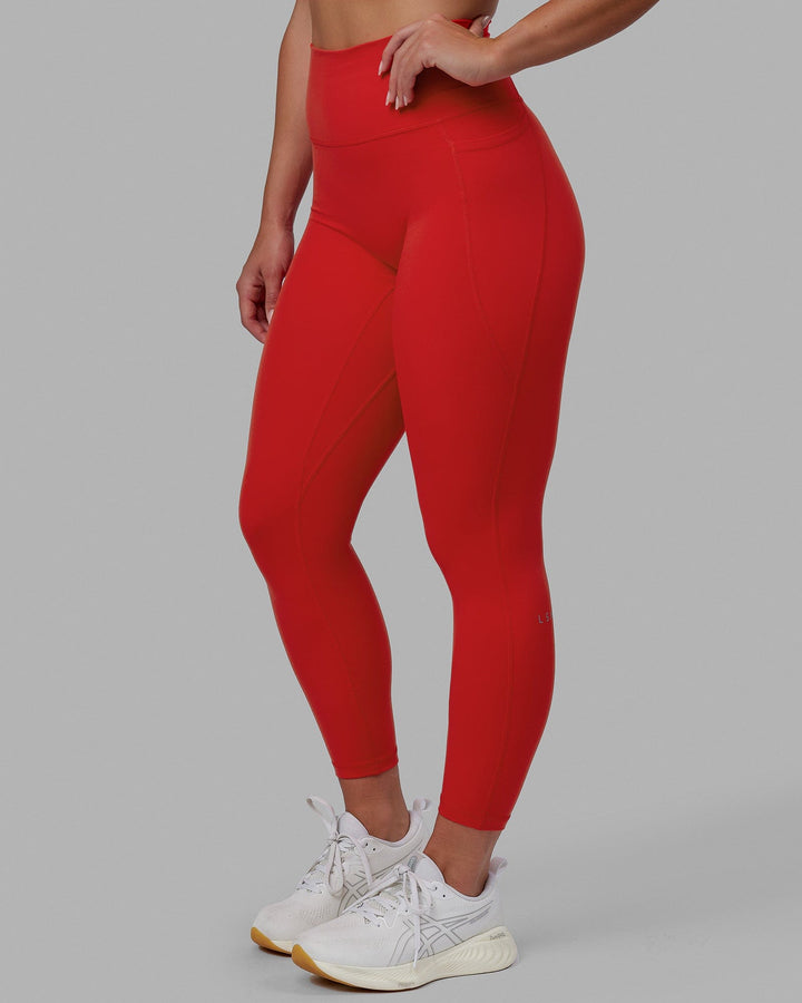 Woman wearing Fusion 7/8 Length Tights - Infrared