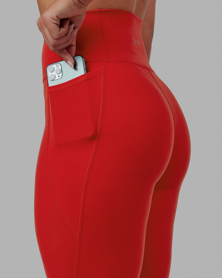 Woman wearing Fusion 7/8 Length Tights - Infrared