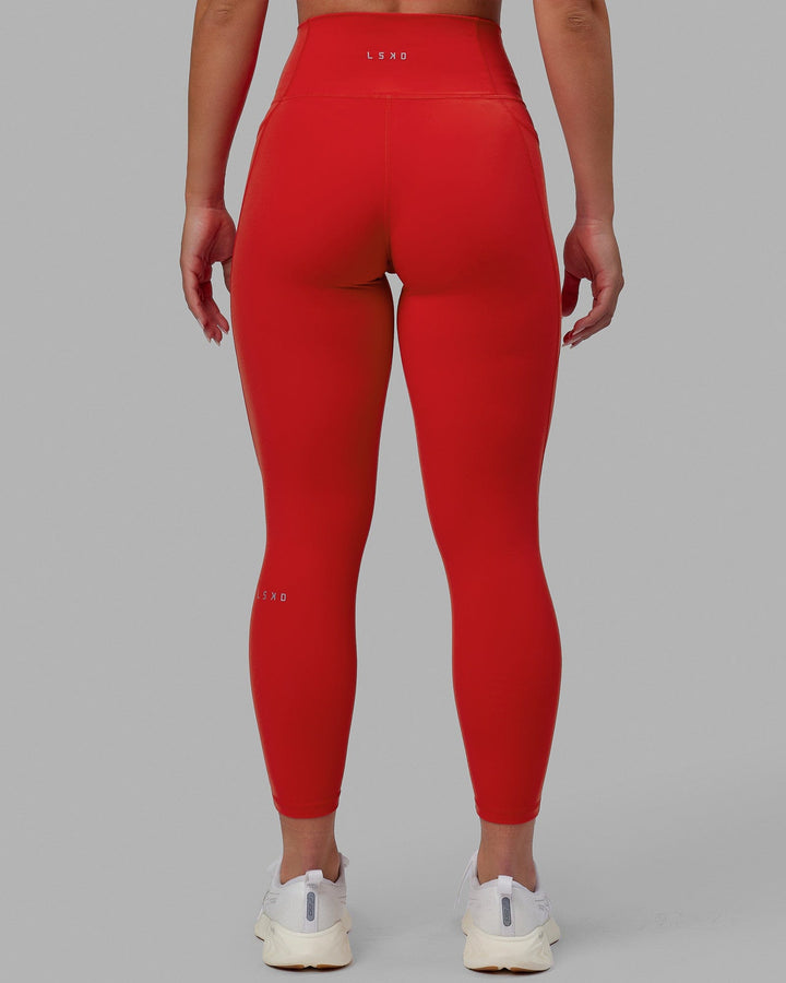 Woman wearing Fusion 7/8 Length Tights - Infrared
