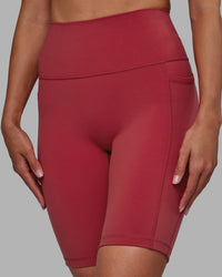 Woman wearing Fusion Ultra High-Rise 9" Short Pockets - Claret | Model:Blaize | Size:S