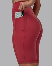 Woman wearing Fusion Ultra High-Rise 9" Short Pockets - Claret | Model:Blaize | Size:S