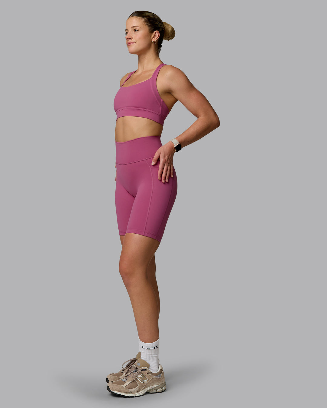 Woman wearing Fusion Ultra High-Rise 9&quot; Short Pockets - Mauve Haze | Model:Chloe | Size:XS