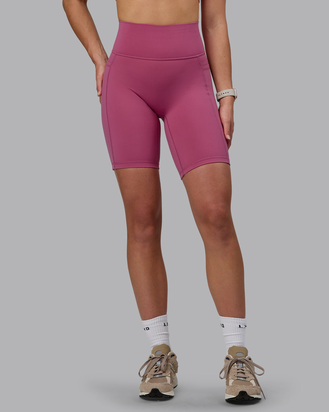 Woman wearing Fusion Ultra High-Rise 9&quot; Short Pockets - Mauve Haze | Model:Chloe | Size:XS