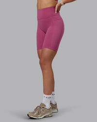 Woman wearing Fusion Ultra High-Rise 9" Short Pockets - Mauve Haze | Model:Chloe | Size:XS