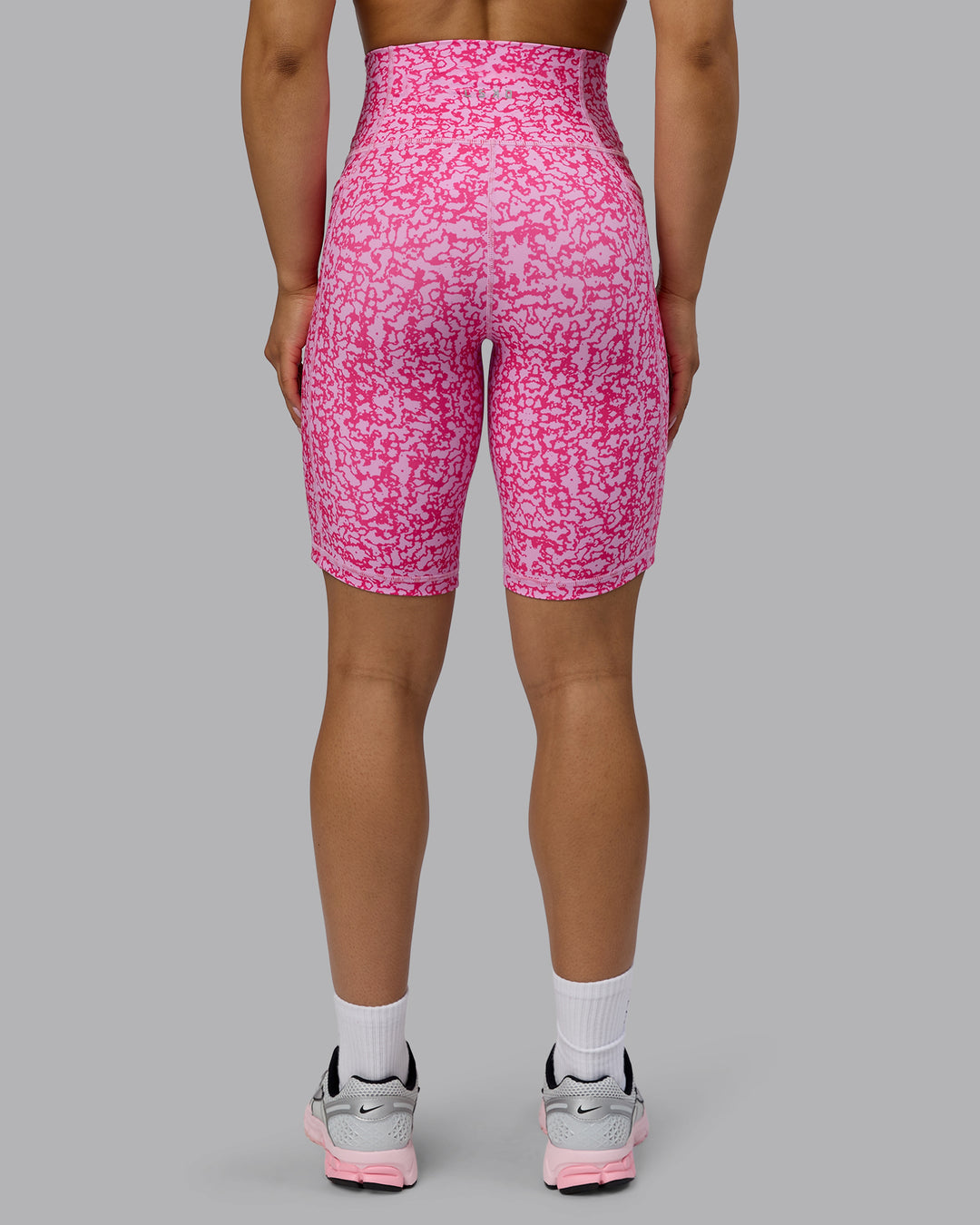 Woman wearing Fusion Ultra High-Rise 9&quot; Short Pockets - Patina-Ultra Pink | Model:Tarnie | Size:S