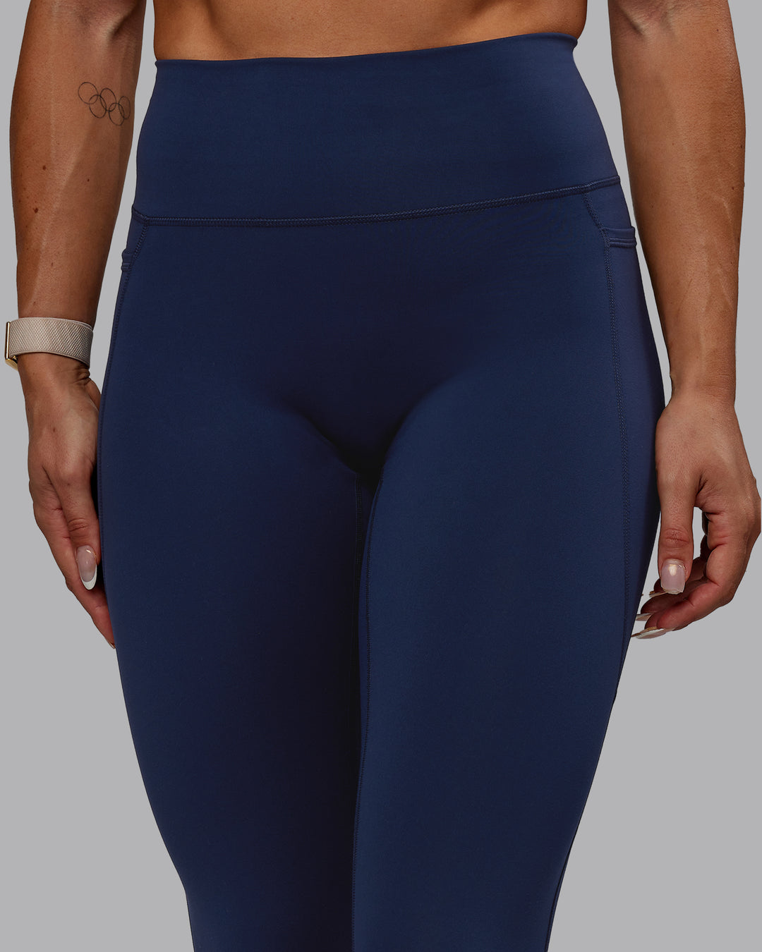 Woman wearing Fusion Ultra High-Rise Full Length Legging Pockets - Future Navy | Model:Bree | Size:S
