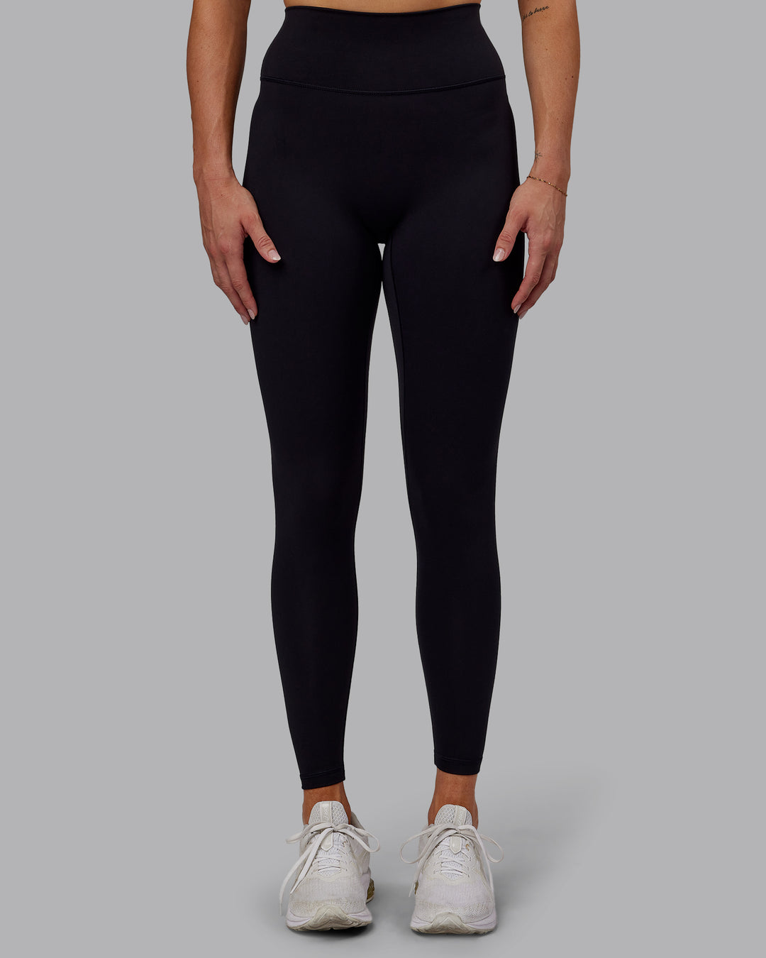 Woman wearing Fusion Ultra High-Rise Full Length Legging - Black | Model:Hannah | Size:S