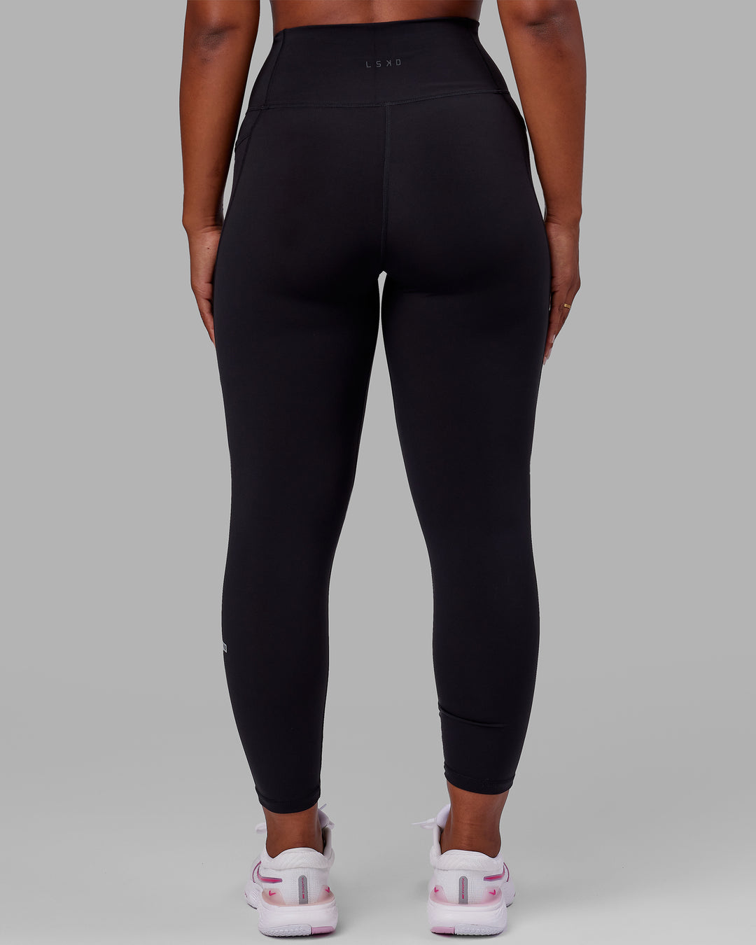 Woman wearing Fusion Ultra High-Rise Full Length Legging Pockets - Black Reflective | Model:Sierra | Size:L