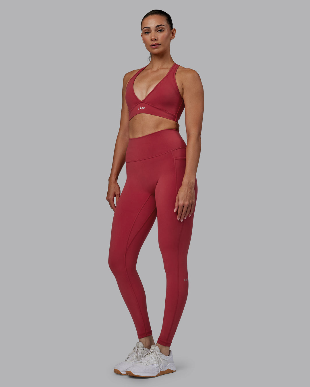 Woman wearing Fusion Ultra High-Rise Full Length Legging Pockets - Claret | Model:Blaize | Size:S