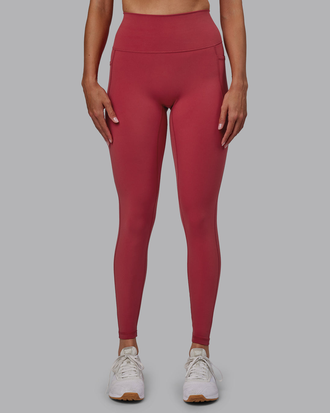 Woman wearing Fusion Ultra High-Rise Full Length Legging Pockets - Claret | Model:Blaize | Size:S