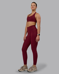 Woman wearing Fusion Ultra High-Rise Full Length Legging Pockets - Cordovan | Model:Chloe | Size:XS