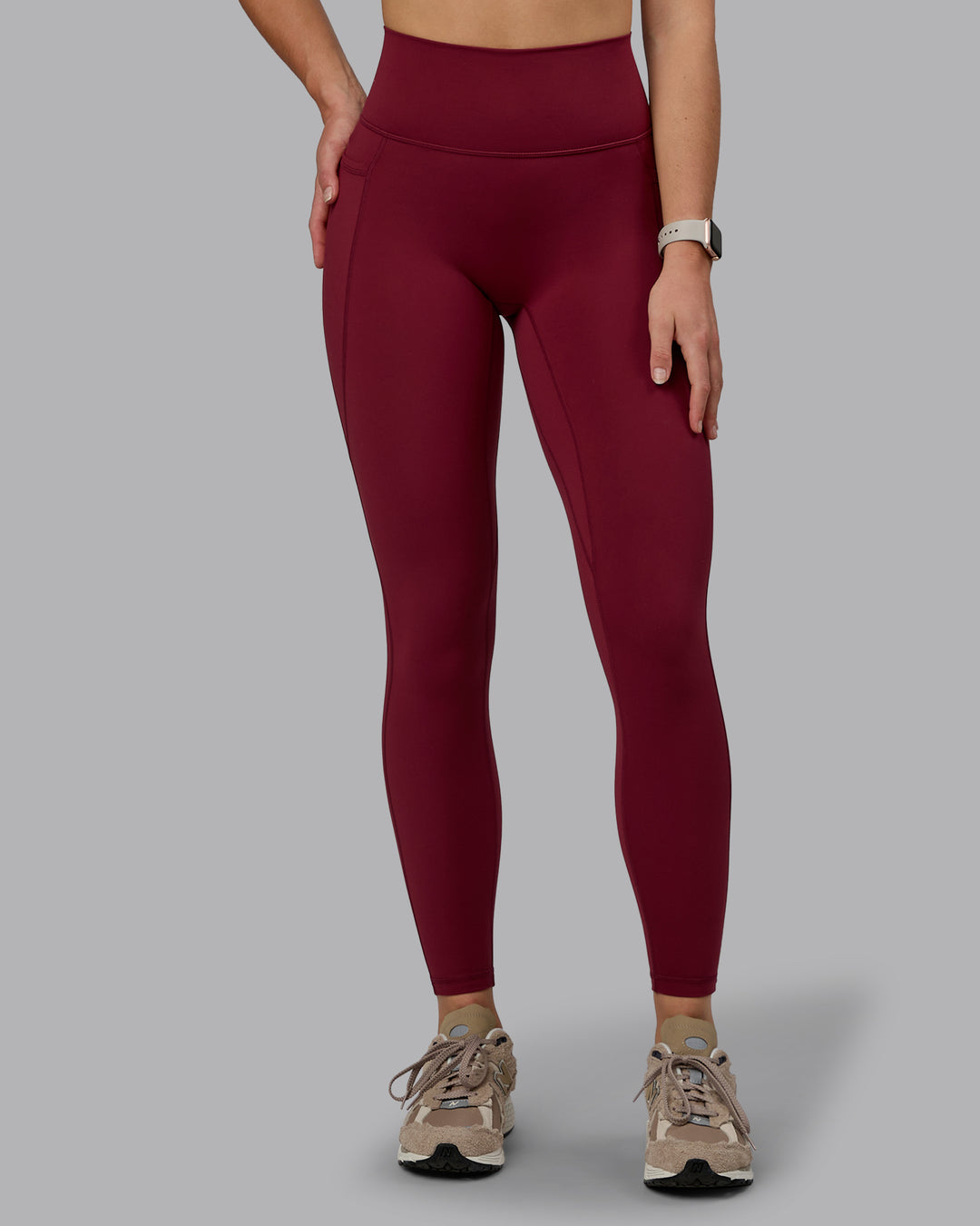 Woman wearing Fusion Ultra High-Rise Full Length Legging Pockets - Cordovan | Model:Chloe | Size:XS